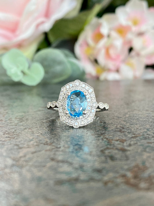 10KT .36ct Diamond and Blue Topaz Gemstone Ring